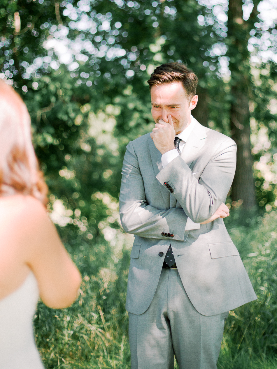 Minimalist Modern Winnipeg Wedding | Photographed by Esther Funk Photography | Winnipeg Country Club Wedding | St. Charles Country Club Wedding | First Look | Groom's reaction is the best